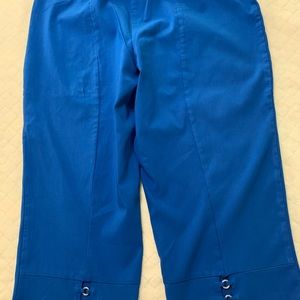 Size 20W, like new,  blue capris w/interesting back detail, very trendy